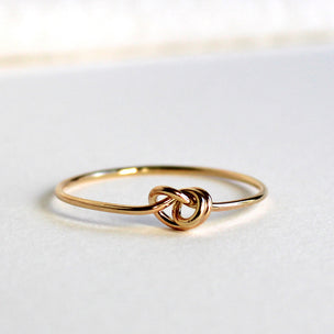 Cupid Ring in 9kt Yellow / Rose Gold with Knot